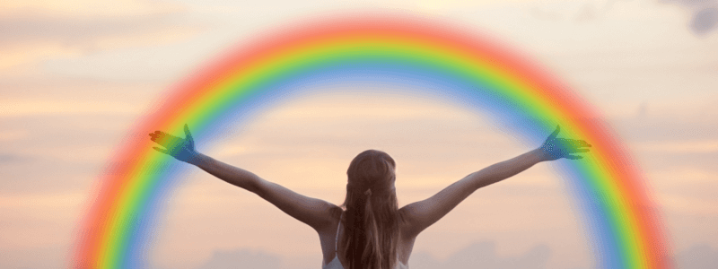 虹と女性