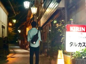 案件獲得の経緯について話す村田さん