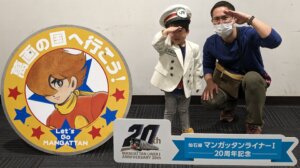 お子さんと記念写真を撮る渡辺さん